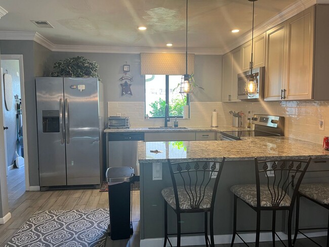 Building Photo - Fully Furnished 3-Bedroom Home in Palm Coa...