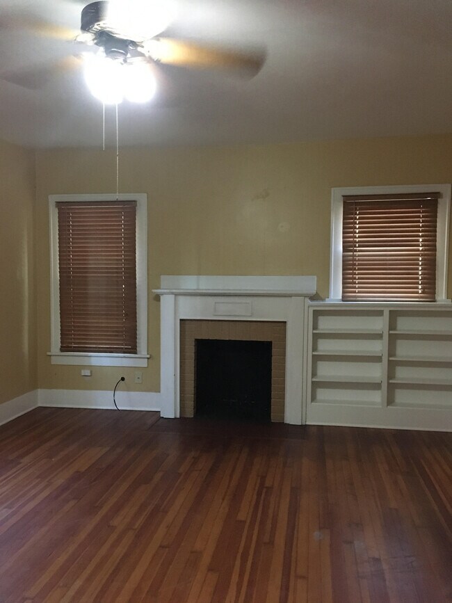 living area with fireplace - 821 Mantooth Ave