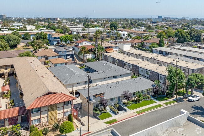 Air POV - Retro Style Apartment Building with Pool and Gym - Secure, Modern and Lease-Ready!