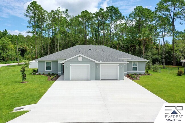 Foto del edificio - FULLY FENCED, LIKE NEW 3/2/1 TOWNHOUSE ON A CUL DE SAC IN BEAUTIFUL SEMINOLE WOODS