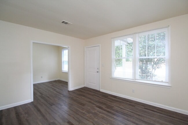 Building Photo - 2BR Cottage Home with LVP Flooring Throughout, Bonus Sunroom, Covered Parking & Low-Maintenance L...