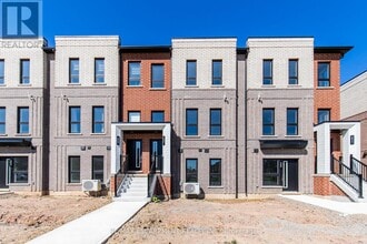 Building Photo - 70-70 Kenesky Dr