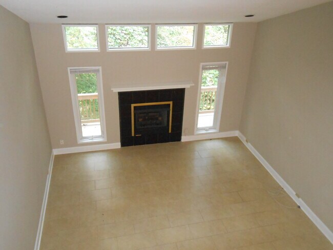 View of living room from upstairs landing - 903 E Franklin St