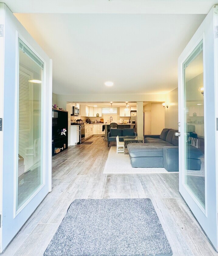 Double door entrance from garden into apartment - 2112 155th Ln SE