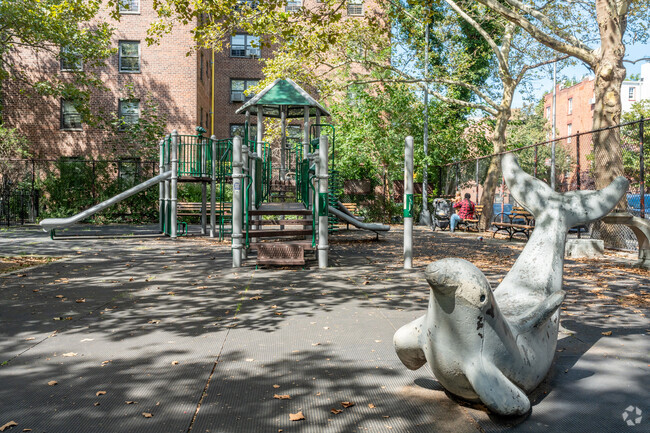 Nicholas Naquan Heyward Jr. Park features multiple jungle gyms with open areas in Boerum Hill.