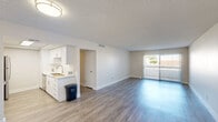 Located in Scottsdale, AZ, this well-appointed 2-bedroom, 2-bathroom single-floor residence offers a clean, modern aesthetic throughout. Light-toned luxury vinyl plank flooring flows seamlessly across every room, complementing the bright, neutral color palette that gives the entire space an open and airy feel.

The open-concept living and dining area is a central highlight, anchored by a sliding glass door that fills the room with natural light and provides direct access to a private outdoor patio. The kitchen is efficiently designed in a galley layout, featuring white shaker-style cabinetry with brushed nickel hardware, quartz countertops, a subway tile backsplash, a stainless steel undermount sink, and stainless steel appliances including a refrigerator and dishwasher. A pantry provides additional storage.

The spacious primary bedroom offers a generous footprint with ample closet space. The second bedroom is equally bright, with a window overlooking the surrounding neighborhood. Both bathrooms are finished with white vanity cabinetry, quartz countertops, large mirrors, and modern light fixtures. Each bathroom includes its own dedicated closet storage.

Textured ceilings, clean white trim, and consistent flooring throughout tie the home together into a cohesive, move-in-ready living environment.