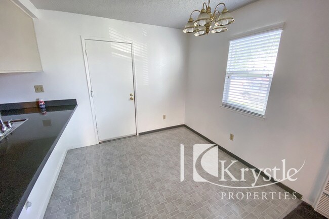 Building Photo - Two level townhouse with two car garage