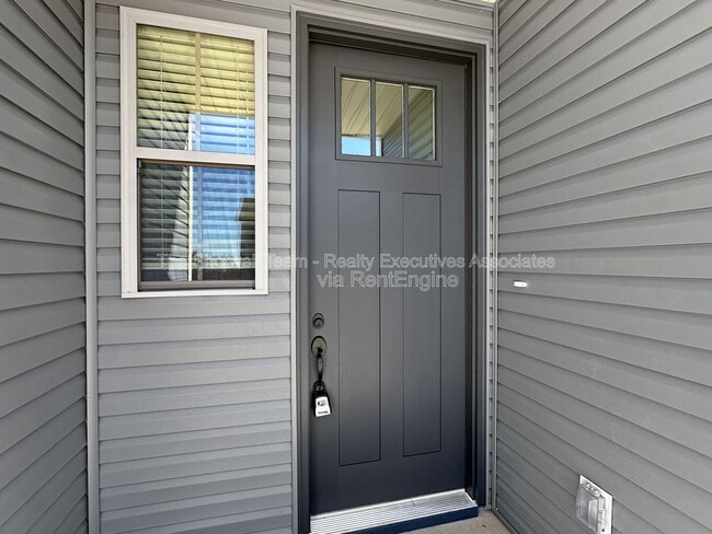 Photo - 1724 Bennett Vlg Dr Townhome