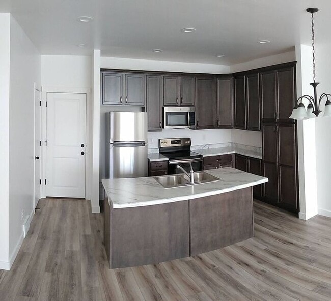 Building Photo - Beautiful Row End Townhouse w 2 car attached