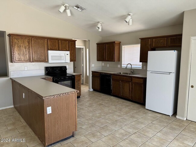 Building Photo - 12502 W Charter Oak Rd