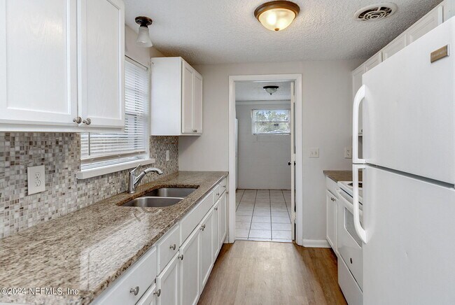 Building Photo - 8392 Fury Dr