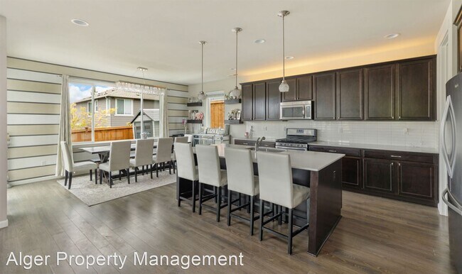 Foto del edificio - 4 br, 3 bath House - 2415 NE Boulderstone Ct.