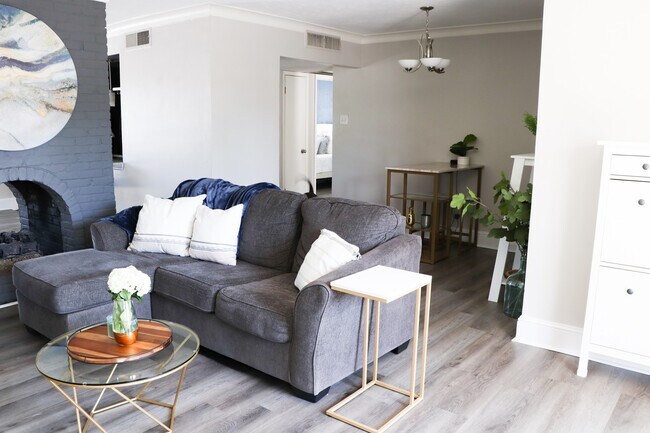 Living room + dining/den - 5917 E University Blvd