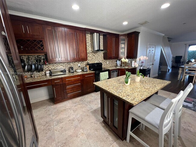 Building Photo - 3938 Mango Dr