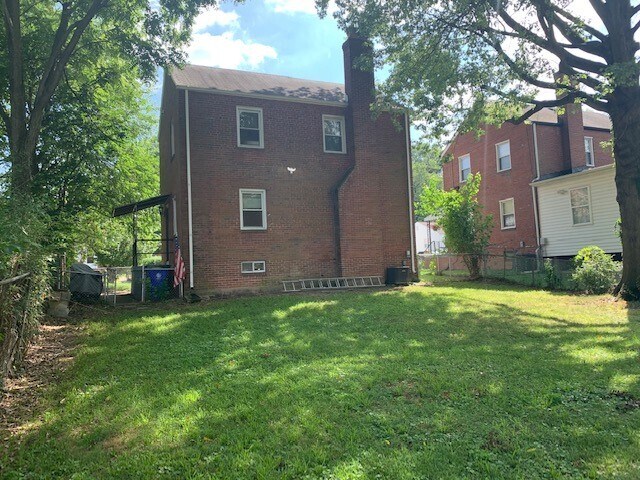 rear of house with backyard - 4820 Fox St