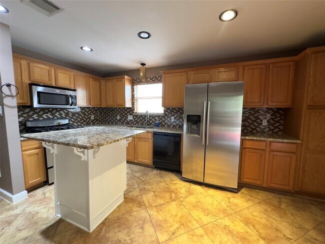 Building Photo - 14420 Spearmint Tea Trail