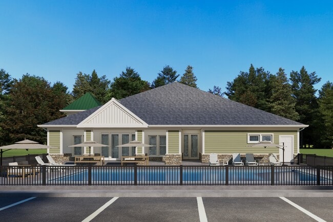 Elegant Exterior View of the clubhouse and pool at Greenwood Commons Apartments, Delaware - Greenwood Commons Apartments