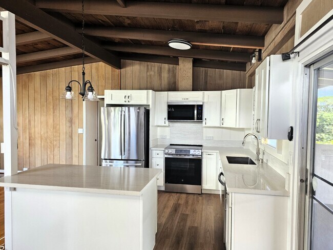 Foto del edificio - 4 bed, 2.5 bath single family house, Liliha neighborhood.