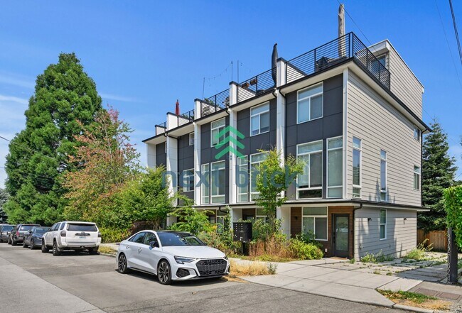 Foto del edificio - "Charming 3-Bedroom Townhouse Oasis in Heart of Seattle – Spacious 1460 Sq Ft with 2 Full Baths!"