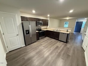 Building Photo - 2020 Wiggins Village Dr