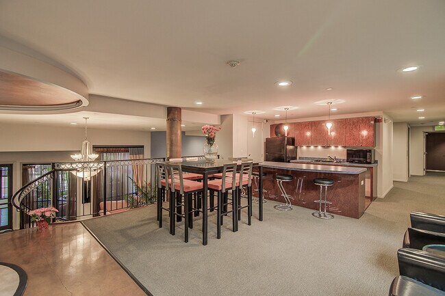 Building Photo - Top floor corner one-bedroom in the heart of it all, don't miss out, tour today!