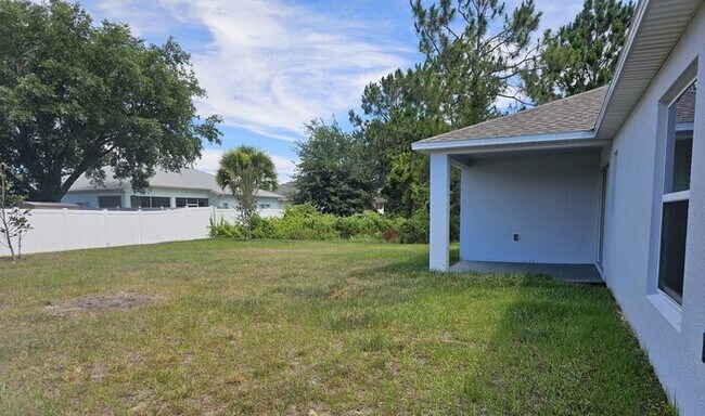 Foto del edificio - *** 1ST MONTH RENT FREE*** BEAUTIFUL 4/2 HOME IN PALM COAST