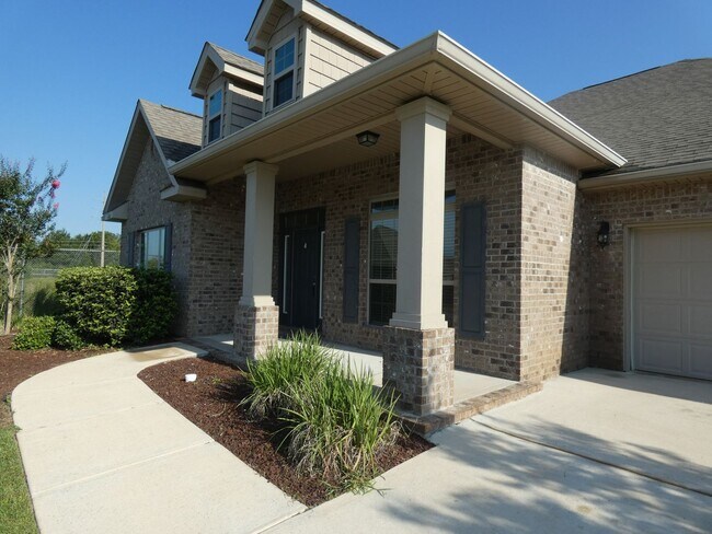 Building Photo - Spacious 5-Bedroom Home - Heart of Pace