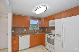 Building Photo - 6650 Royal Palm Blvd