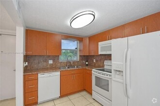 Building Photo - 6650 Royal Palm Blvd