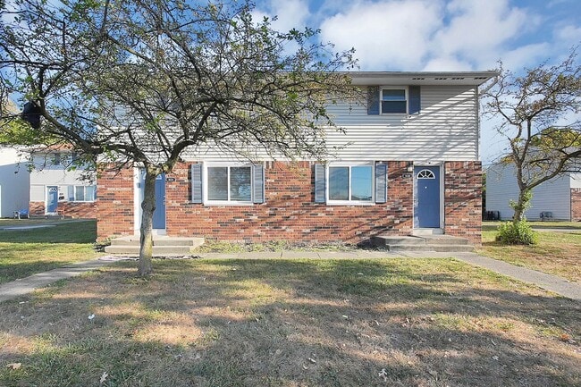 Building Photo - 1652 E 25th Ave