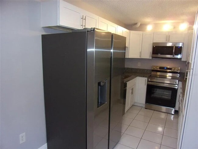 Foto del edificio - 2-Bed, 2-Bath Condo Retreat in Serene Tarpon Springs Oasis!
