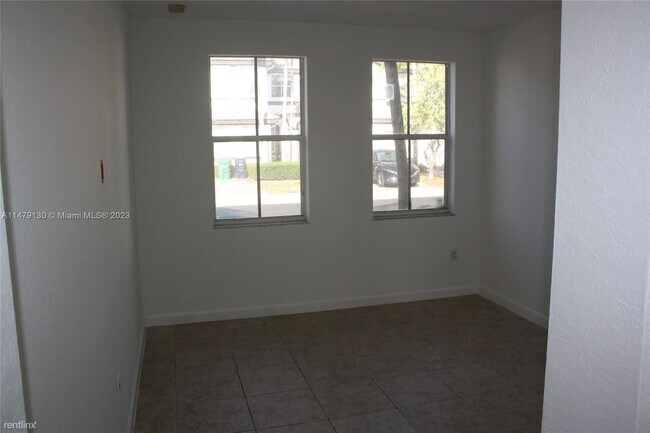 Building Photo - 3 br, 2.5 bath House - 7637 NW 116th Ave