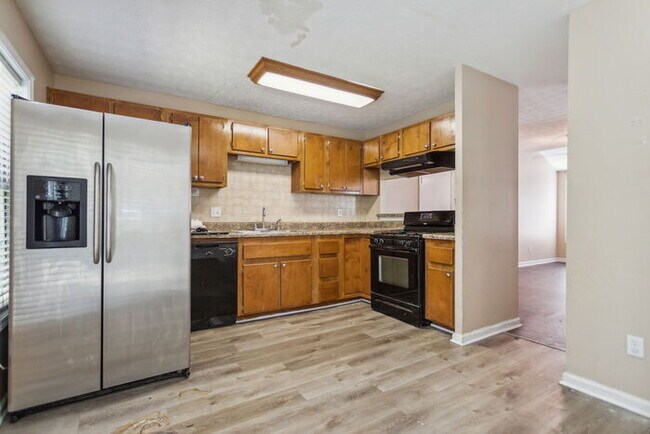 Building Photo - Spacious, unique, a perfect 3 bedroom home...