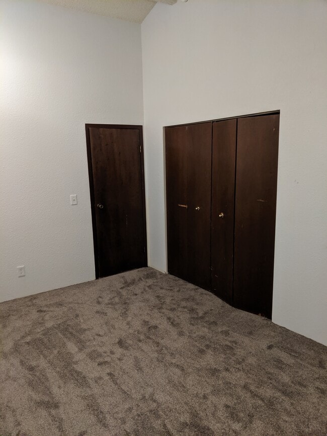 Bedroom 1 looking towards the door to the landing and to the closet. - 2115 Pleasanton St