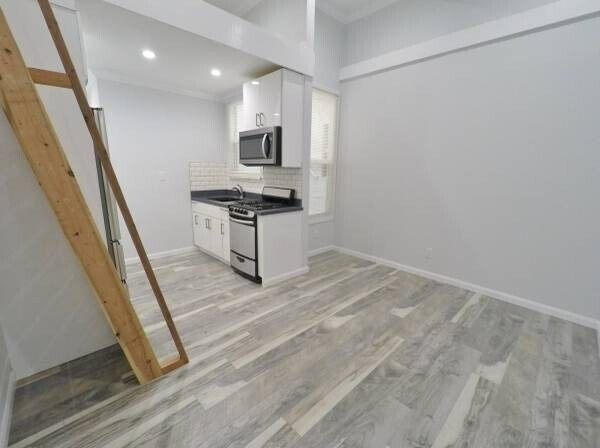 Building Photo - 1 Month Free! Renovated Studio w/ Modern K...