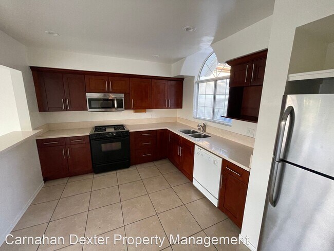 Building Photo - 3 br, 2.5 bath House - 5107 Cerrillos Dr.