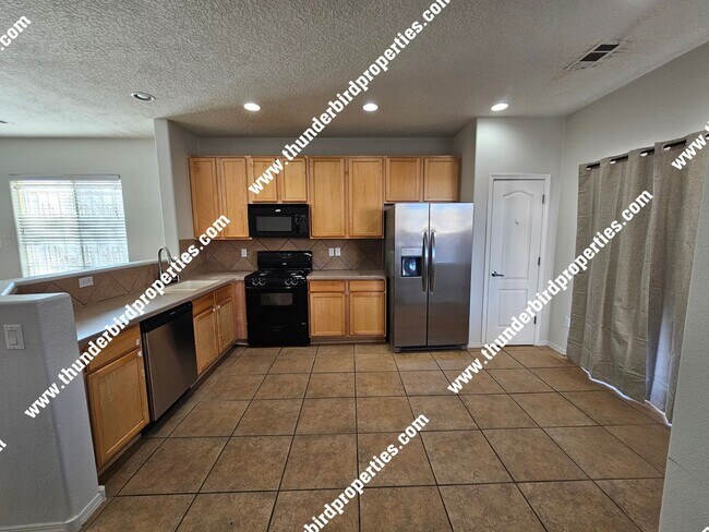 Building Photo - 4 Bedroom - 2.5 Bathroom - 2 car garage