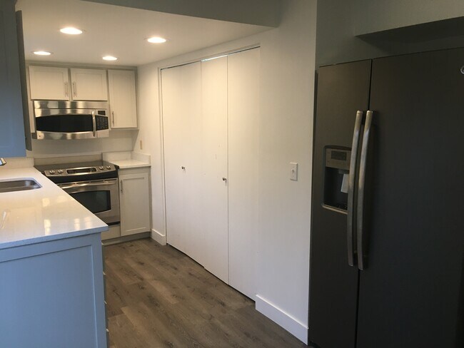 Laundry is behind bi-fold doors - 1070 E Atkin Ave Townhome