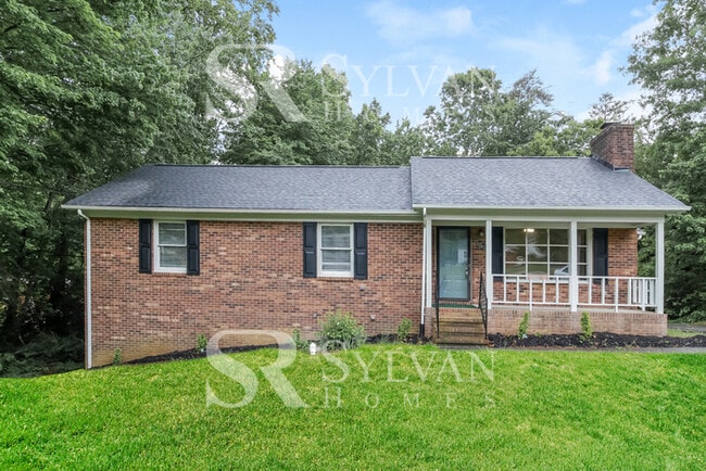 Photo - Enjoy living the good life in this 4 BR, 3 BA brick rancher House