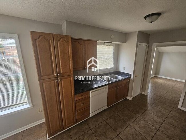 Building Photo - 6149 Raintree Dr