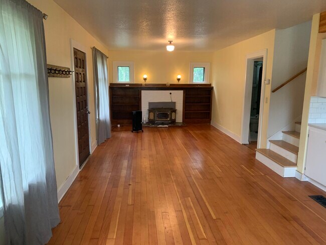 Large living room with cozy built-ins - 5636 SE Ogden St
