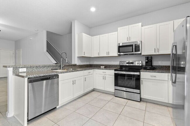 Building Photo - NEWLY UPGRADED Town Home For Rent in Touchstone!