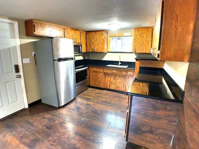 Building Photo - Adorable log cabin style home for rent near Hwy-50 and Safeway!