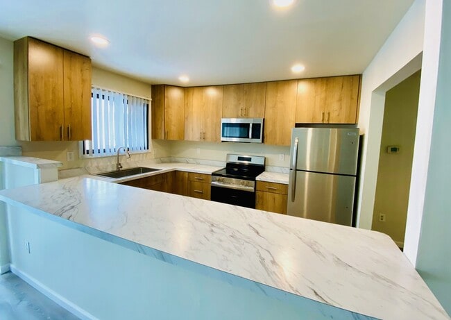 Updated Spruce Kitchen - Eastern Lofts Apartment Homes