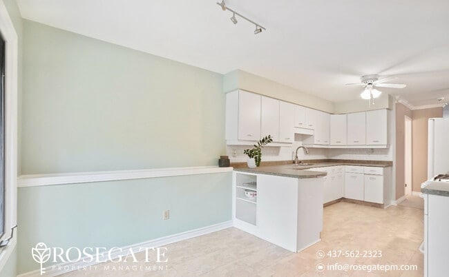 Building Photo - Spacious 5-Bedroom Home with Balcony & Hug...