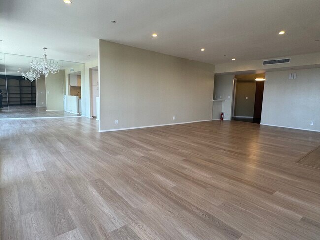 Living room looking to dining room - 10551 Wilshire Blvd