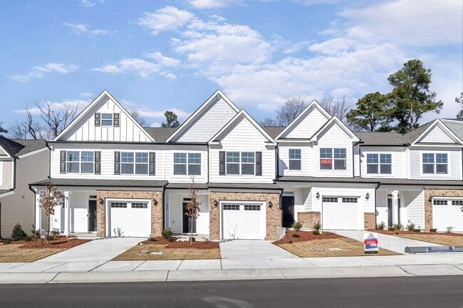 Photo - Updated Townhome with 1 Car Garage - close to Southpoint!