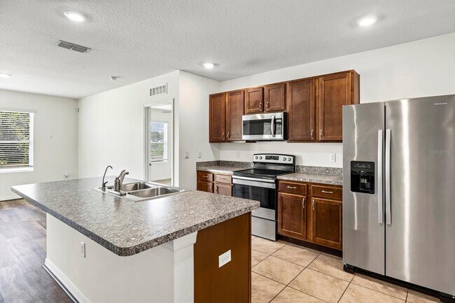 Building Photo - 6381 Trouvaille Pl