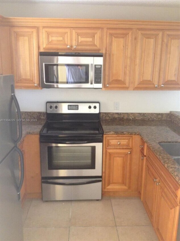 Foto del edificio - 2BR/2BA Ground-Floor Condo in Palm Beach Grande