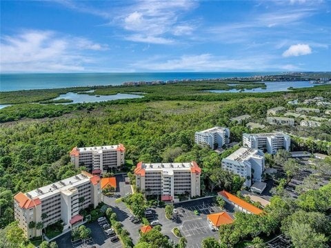 Naples Cove Bldgs. Looking Toward Nature Preserve & Gulf Lagoon - 285 Naples Cove Dr